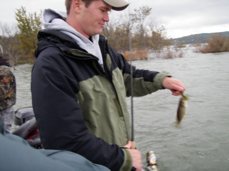 Nico with the first bass in the new boat